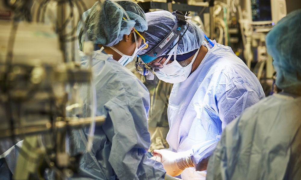 Dr Jasser of the Mass General Corrigan Minehan Heart Center performs surgery. Dr Jasser of the Mass General Corrigan Minehan Heart Center performs surgery.